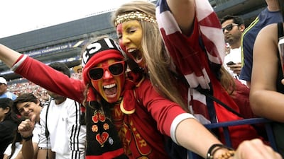 Fans show their support for Manchester United on Saturday at the International Champions Cup match against Real Madrid in the US, at the University of Michigan's Michigan Stadium. Paul Sancya / AP