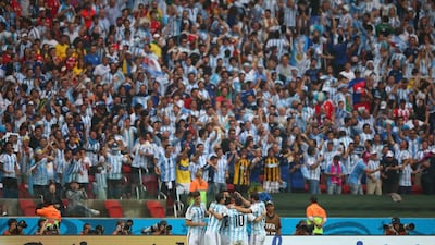 Marcos Rojo of Argentina celebrates scoring the winner on Wednesday in a 3-2 victory over Nigeria at the 2014 World Cup. Ian Walton / Getty Images