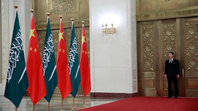 A Chinese security officer stands guard at the door. EPA