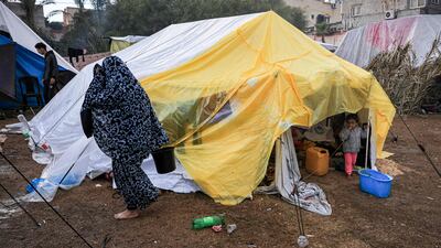 Palestinians taking shelter. AFP