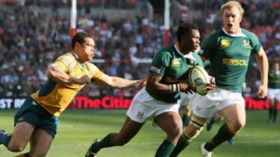 Jongi Nokwe of South Africa dives over to score his fourth try of the match.