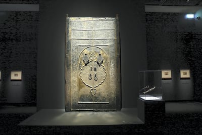 A door to the Kaaba of Makkah’s Grand Mosque in the Roads of Arabia exhibition at Louvre Abu Dhabi. Victor Besa / The National
