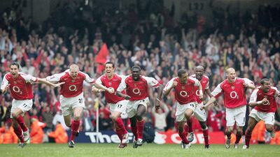 The Arsenal team celebrate Patrick Vieira scoring the last penalty to win the FA Cup Final against Manchester United in 2005. Getty Images