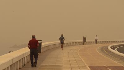 People take a stroll by the sea promenade in Las Palmas de Gran Canaria, Canary Islands, Spain. EPA
