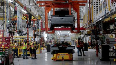 The body and chassis of a Ford all-electric F-150 Lightning pick-up truck prototype at the Rouge Electric Vehicle Centre in Dearborn, Michigan, in September, 2021. Reuters