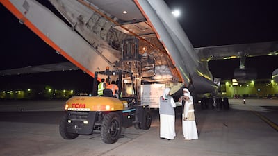 Urgent medical supplies and food is loaded on to plane bound for Afghanistan to help with earthquake relief efforts. Photo: Wam