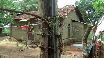 Illegally erected electric fence and traps set up to prevent wild elephants from entering human settlements are seen in Ashraf Nagar in Ampara district. AP