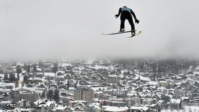 Kazakhstan's Sabirzhan Muminov soars through the air during the men's FIS Ski Jumping World Cup competition in Engelberg, central Switzerland. AFP