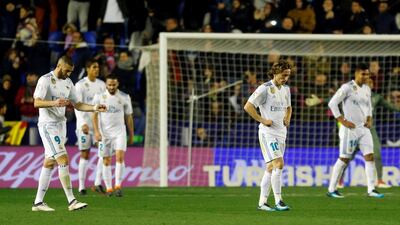 Real Madrid players react to Levante's second equalising goal. Heino Kalis / Reuters