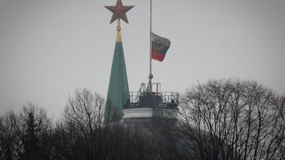 The flag of the President of Russia flies at half mast over the Kremlin as the country observed a day of mourning on Sunday. AP