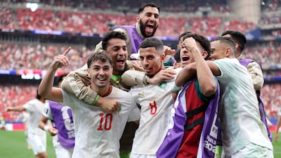 Morocco eased past Canada to reach the World Cup quarter-finals once again. AFP