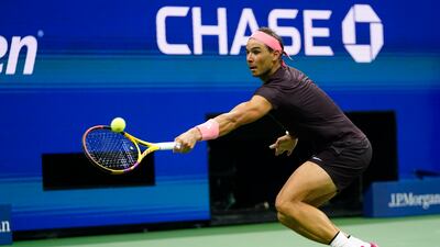 Rafael Nadal returns a shot to Rinky Hijikata. AP Photo