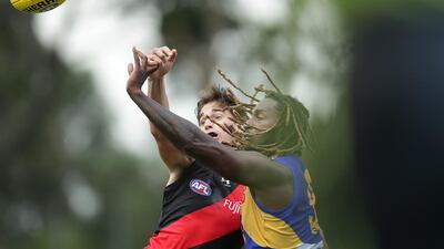Brynn Teakle, of the Essendon Bombers contests a ruck with West Coast Eagles' Nic Naitanui during the 2020 Marsh Community Series Australian rules football match, at Mineral Resources Park in Perth, on Thursday, February 27. Getty