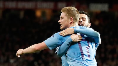 Kevin De Bruyne celebrates after his shot is turned in by Manchester United's Andreas Pereira. PA
