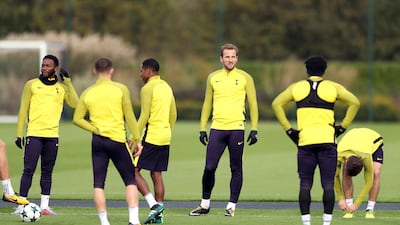 Harry Kane takes part in training with his Tottenham teammates. Adam Davy / PA