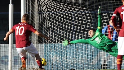 Francesco Totti scored Roma's third goal on Sunday. Felice Calabro / AP