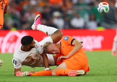 Netherlands' Jan Paul van Hecke suffered a cut to the head after an accidental knee to the head from Morocco's Ismael Saibari. Reuters