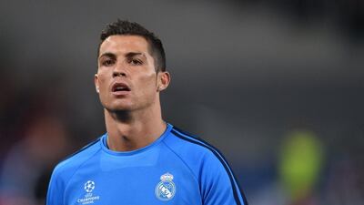 Real Madrid’s Portuguese forward Cristiano Ronaldo warms up before the Uefa Champions League football match AS Roma vs Real Madrid on February 17, 2016 at the Stadio Olimpico in Rome. AFP PHOTO / ALBERTO PIZZOLI