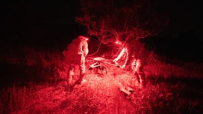 Servicemen of the Achilles Battalion from Ukraine's 92nd Assault Brigade check a Vampire drone after a frontline mission near Chasiv Yar, Donetsk, on May 1, 2024. AFP