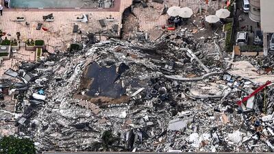 An aerial view of the search and rescue personnel working on site after the partial collapse of the Champlain Towers South in Surfside, north of Miami Beach. Chandan Khanna / AFP