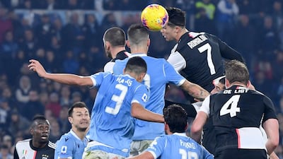 Juventus forward Cristiano Ronaldo and Lazio's Brazilian defender Luiz Felipe contest a header during the Italian Serie A football matchat the Olympic stadium in Rome. AFP