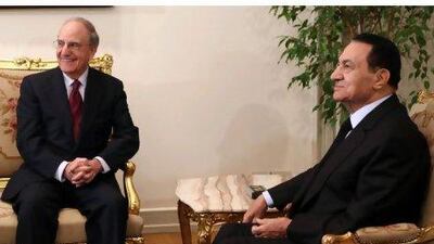 George Mitchell holds talks with the Egyptian president, Hosni Mubarak, right, in Cairo yesterday.