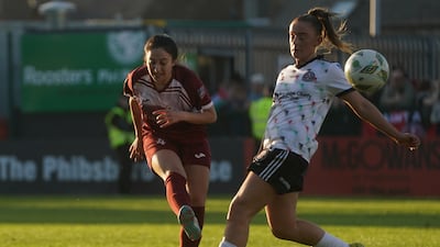 The Bohemians and Palestinian team battle it out in the fading sunshine. PA