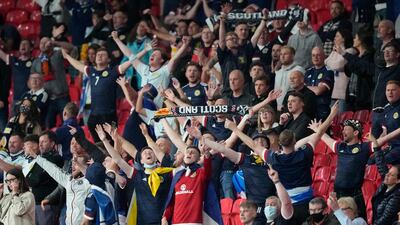 Scotland fans celebrate at Wembley after the match. Reuters