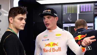 Dj Martin Garrix and Max Verstappen at the Abu Dhabi Formula One Grand Prix. Mark Thompson / Getty Images