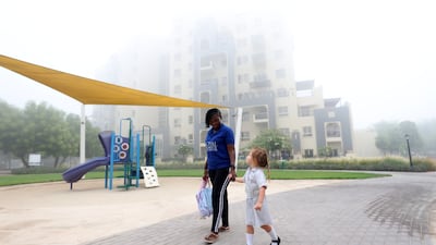 Fog shrouds the Dubai skyline on Wednesday morning. Chris Whiteoak / The National