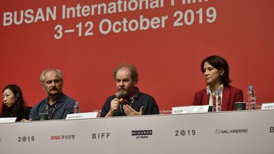 British film director Mike Figgis (C) speaks during a press conference for the New Currents Jury for the Busan International Film Festival (BIFF) in Busan. BIFF runs from October 3 to 12 and features 303 films from 85 countries. AFP