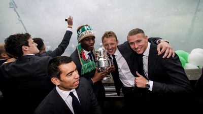 Giovanni van Bronckhorst, in front, and Dirk Kuyt, second from right, have been instrumental in Feyenoord’s good run in the past two seasons. Robin van Lonkhuijsen / AFP