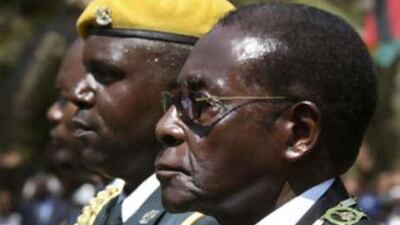 Zimbabwe's president Robert Mugabe arrives for the opening of the county's parliament in Harare on Aug 26 2008.