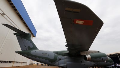 Above, Embraer unveils the KC-390 cargo aircraft in 2014. Paulo Whitaker / Reuetrs