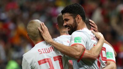 Diego Costa celebrates after scoring Spain's opening goal against Iran. Sergio Perez / Reuters