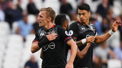 James Ward-Prowse of Southampton, left, celebrates as he scores their third goal against West Ham. Shaun Botterill / Getty Images