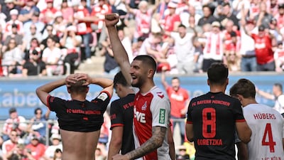 Cologne's Timo Hubers react after Dejan Ljubicic scores their first goal. Reuters