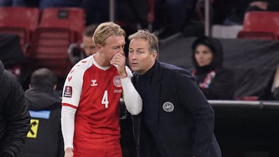 Denmark defender Simon Kjaer and coach Kasper Hjulmand. AFP