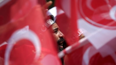 A supporter of Devlet Bahceli, leader of Nationalist Movement Party (MHP), attends an election rally in Ankara, Turkey, on June 23, 2018. Stoyan Nenov / Reuters