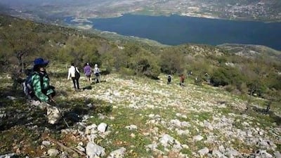 Hikers descend from the Chouf mountains into the Beqaa Valley and Qaraoun Lake in Lebanon.