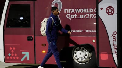 Marcus Rashford heads for the bus. AP
