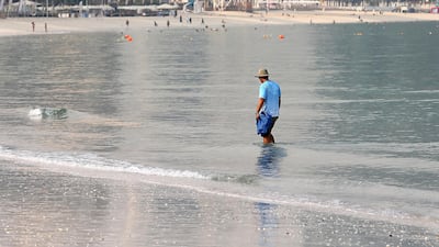 The clean-up mission departed from Zero Gravity, and worked its way down the JBR beach. Satish Kumar / The National