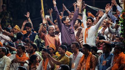 Supporters of Indian prime minister-elect Narendra Modi cheer after Modi and senior Bharatiya Janata Party leaders performed a religious ritual at the banks of the River Ganges in Varanasi, India. Roberto Schmidt / AFP