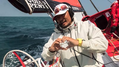 Ying Kit Cheng videochats with his family from aboard the Dongfeng Race Team boat on Saturday as Dongfeng sail to their home port of Sanya, China during the third leg of the Volvo Ocean Race. Sam Greenfield / Dongfeng Race Team / Volvo Ocean Race / January 24, 2015