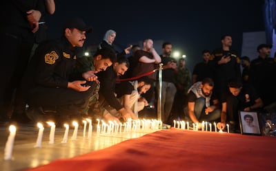 Members of Iraq's Popular Mobilisation Forces and supporters gather in Tahrir Square, Baghdad. The role of militias and paramilitaries has been a contentious issue in Iraq. EPA