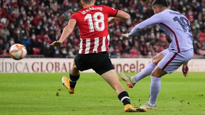Ferran Torres curls home his first goal since moving to Barca. AFP