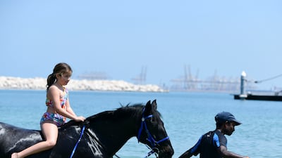 The children's pony camp at JA Equestrian Centre, where swimming with horses is the highlight of the two-morning session. All photos: Khushnum Bhandari / The National