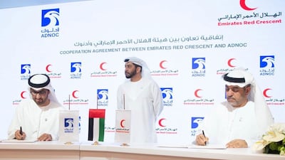 The Adnoc Group and Emirates Red Crescent sign a partnership agreement. Courtesy Adnoc