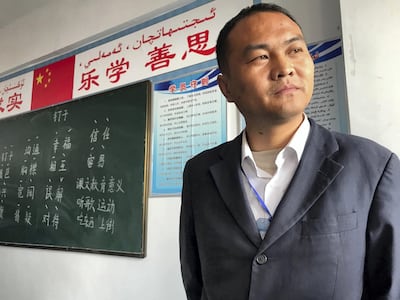A Mandarin instructor gives a lesson on patience at the Wensu County Vocational Skills Training Centre