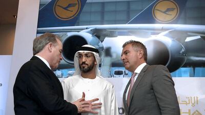 From left, James Hogan, the chief executive of Etihad Aviation Group, Mohamed Al Mazrouei, the Etihad chairman and Lufthansa’s Carsten Spohr. Jeffrey E Biteng / The National